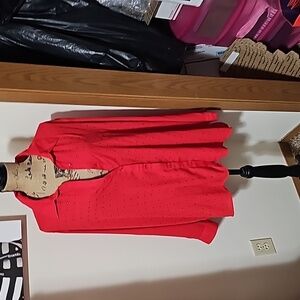 3x button down light weight top. Front of the top features red rinestones.